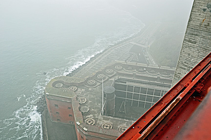 looking down from the side of the bridge